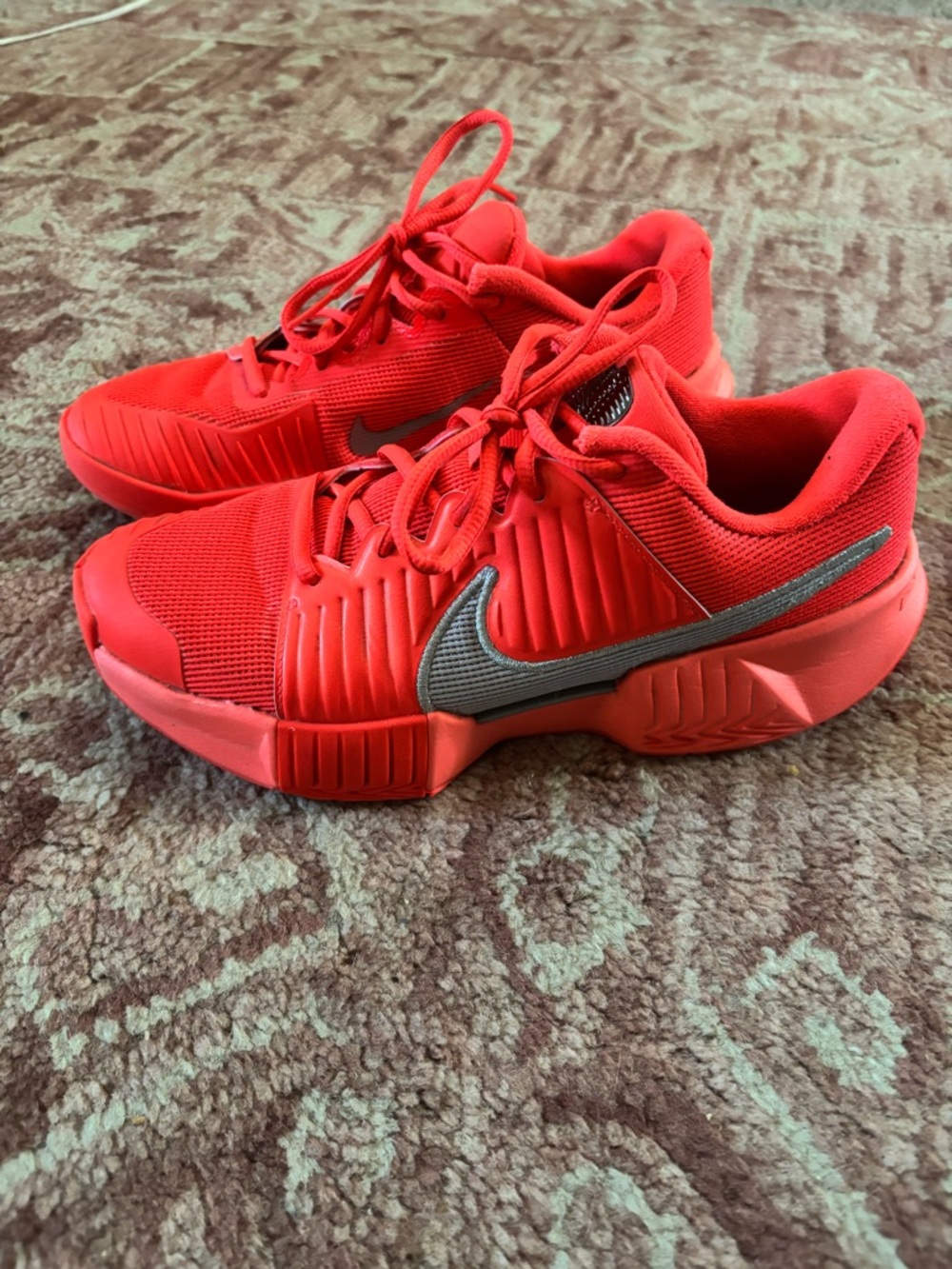 Nikes vibrant orange Women's Athletic Sneakers with Swoosh